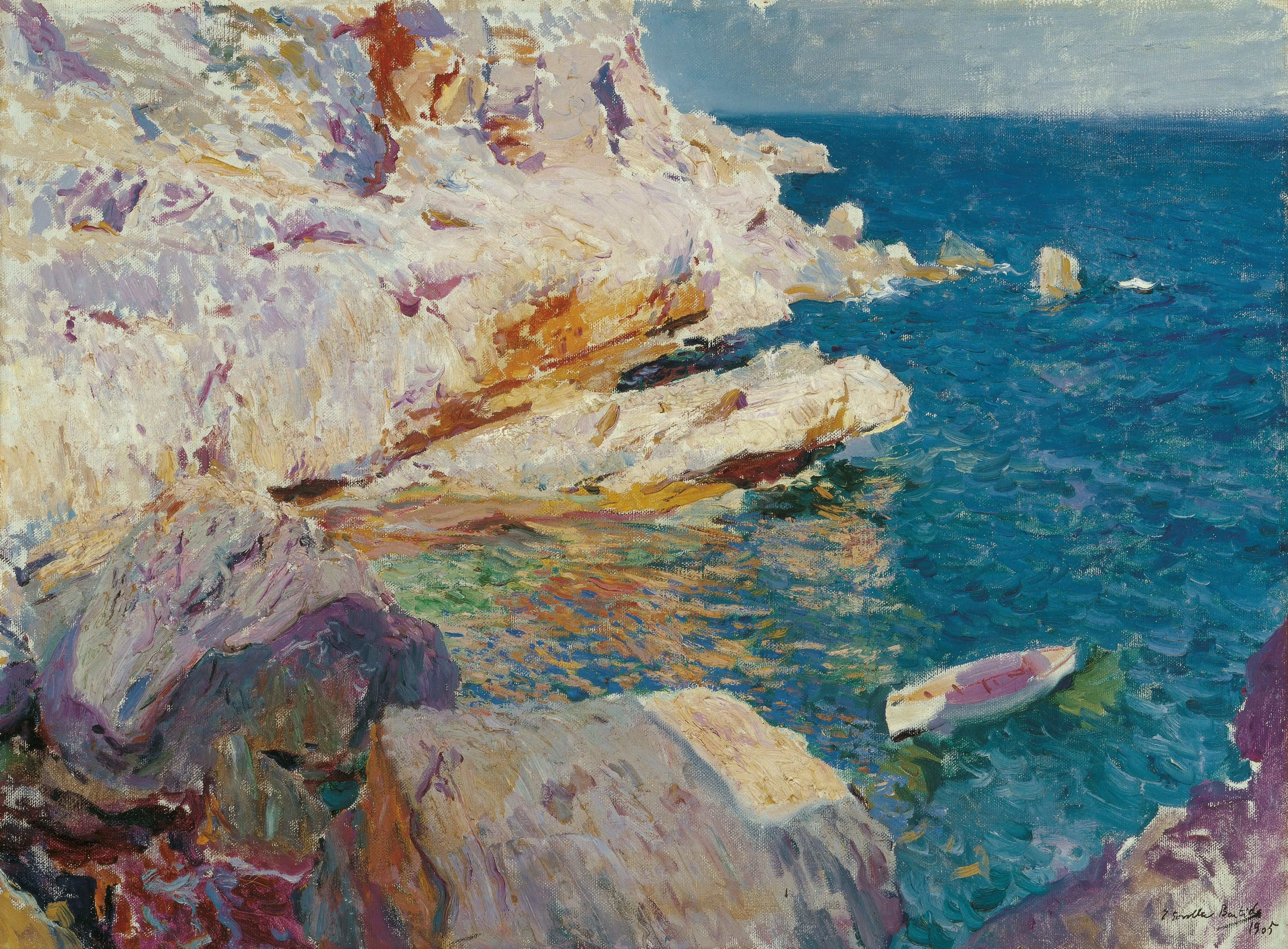 Sunlit rocks plunge into brilliant turquoise water at Jávea, a small white boat riding the swell below the cliffs.