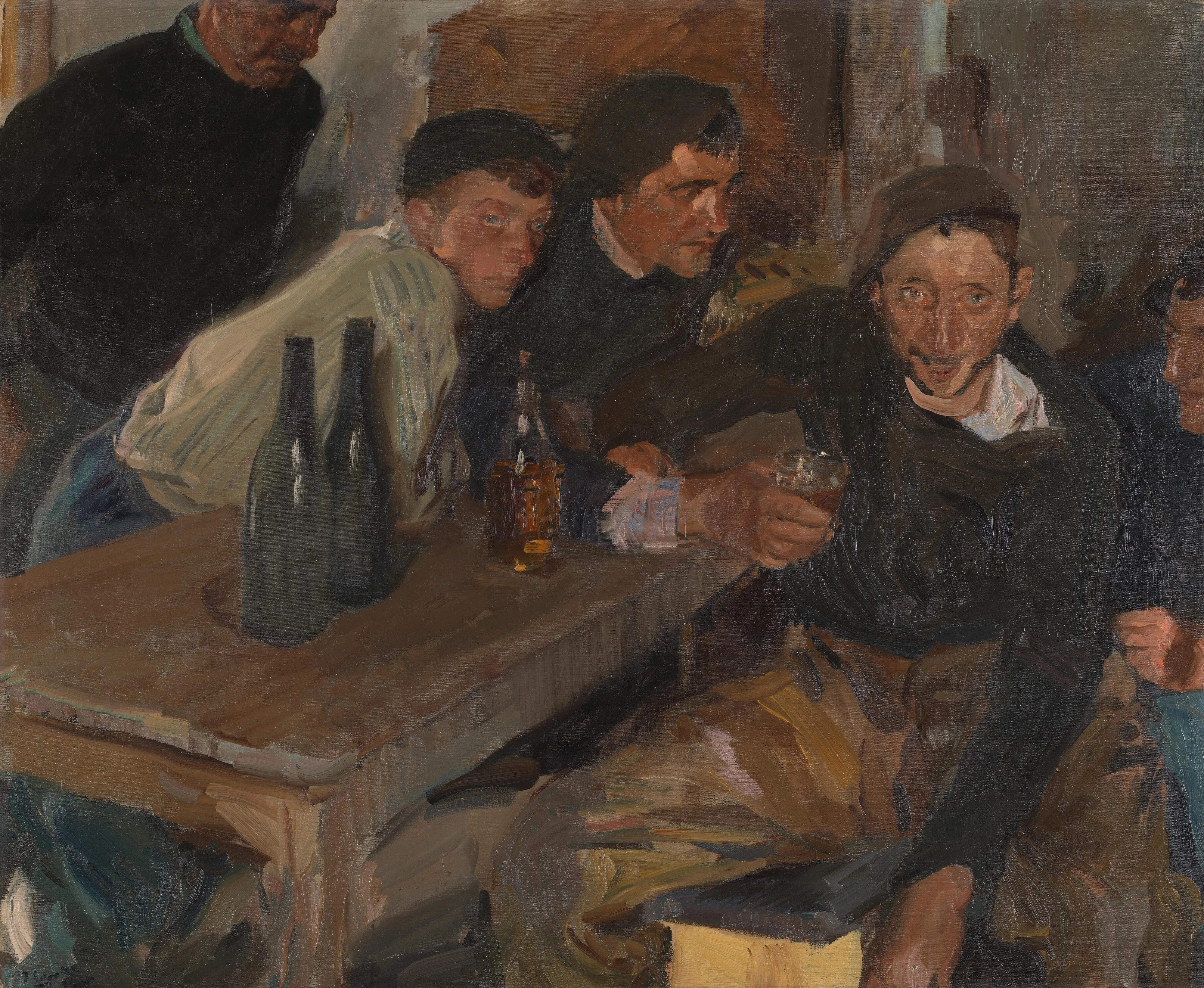 Basque fishermen gather around a rough table at Zarauz, one man slumped in drink, their weathered faces caught in warm light.