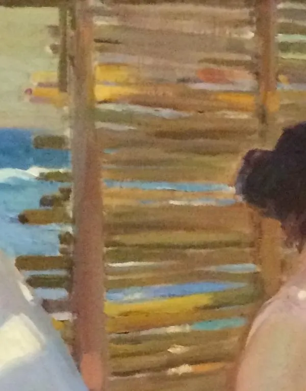 Close-up of the sunlit sea glimpsed through the gaps of a cane beach screen in The Pink Robe by Sorolla — short confident strokes of blue, ochre and white standing in for surf and light