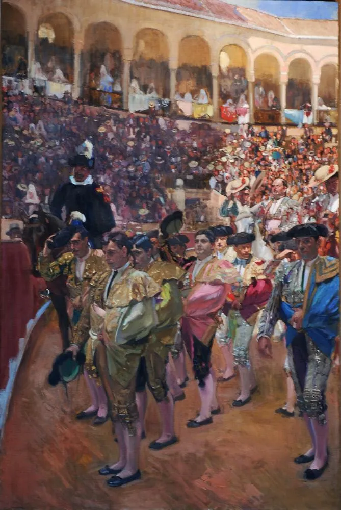 Bullfighters and picadors in embroidered costume sit mounted before the ring, their finery and horses glowing in strong Sevillian light.