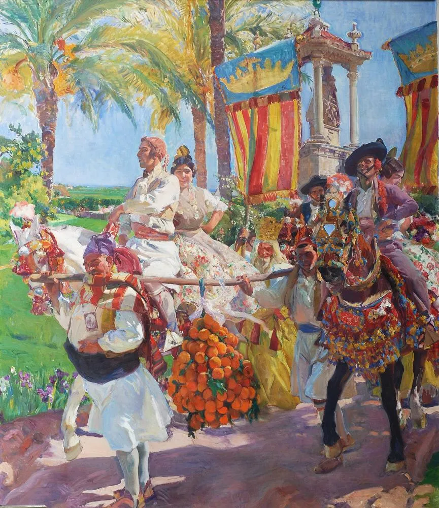 Valencian couples ride two to a horse in festival finery, the women's embroidered dresses and flowers vivid against the sunny procession.